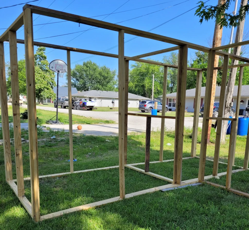 front view of the frame to the kidding stall and milking room of the goat barn